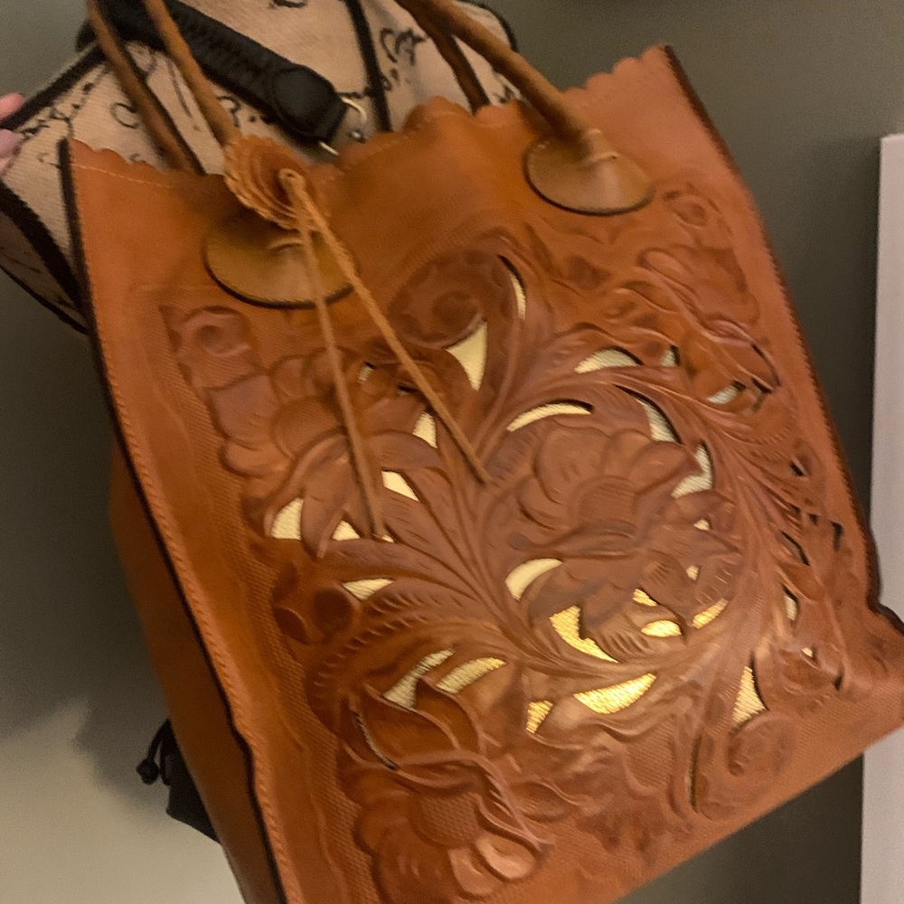 Handbag and matching clutch wallet.